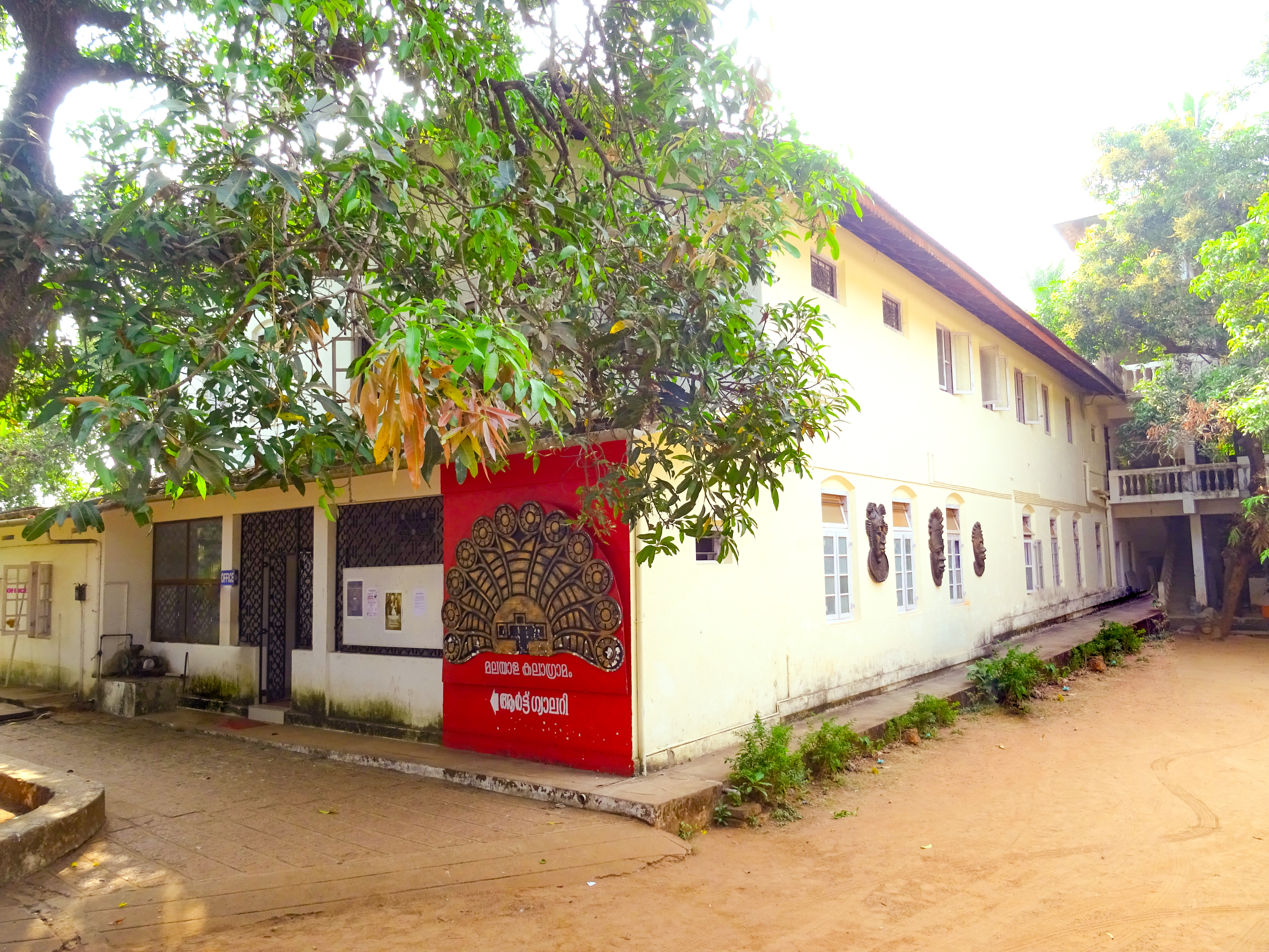 Art students attending a painting workshop at Mahe Malayala Kala Gramam