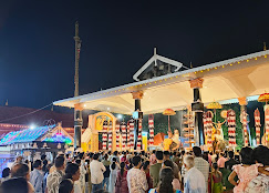 Temple courtyard and brass pagoda at Thiruvangad Temple
