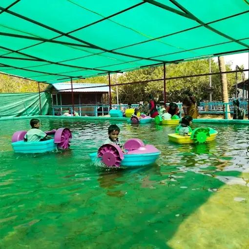 Mini houseboat ride at Vayalapra Floating Park